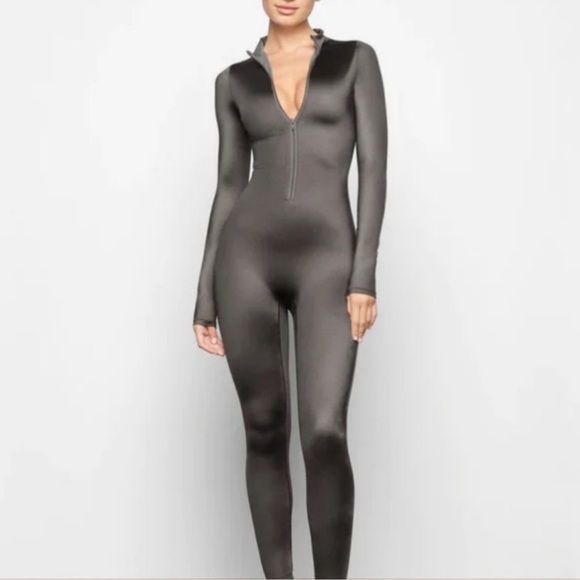 SKIMS Pants - Skims long sleeve shiny jumpsuit front zip